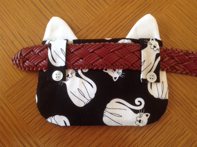 Fixation sur ceinture