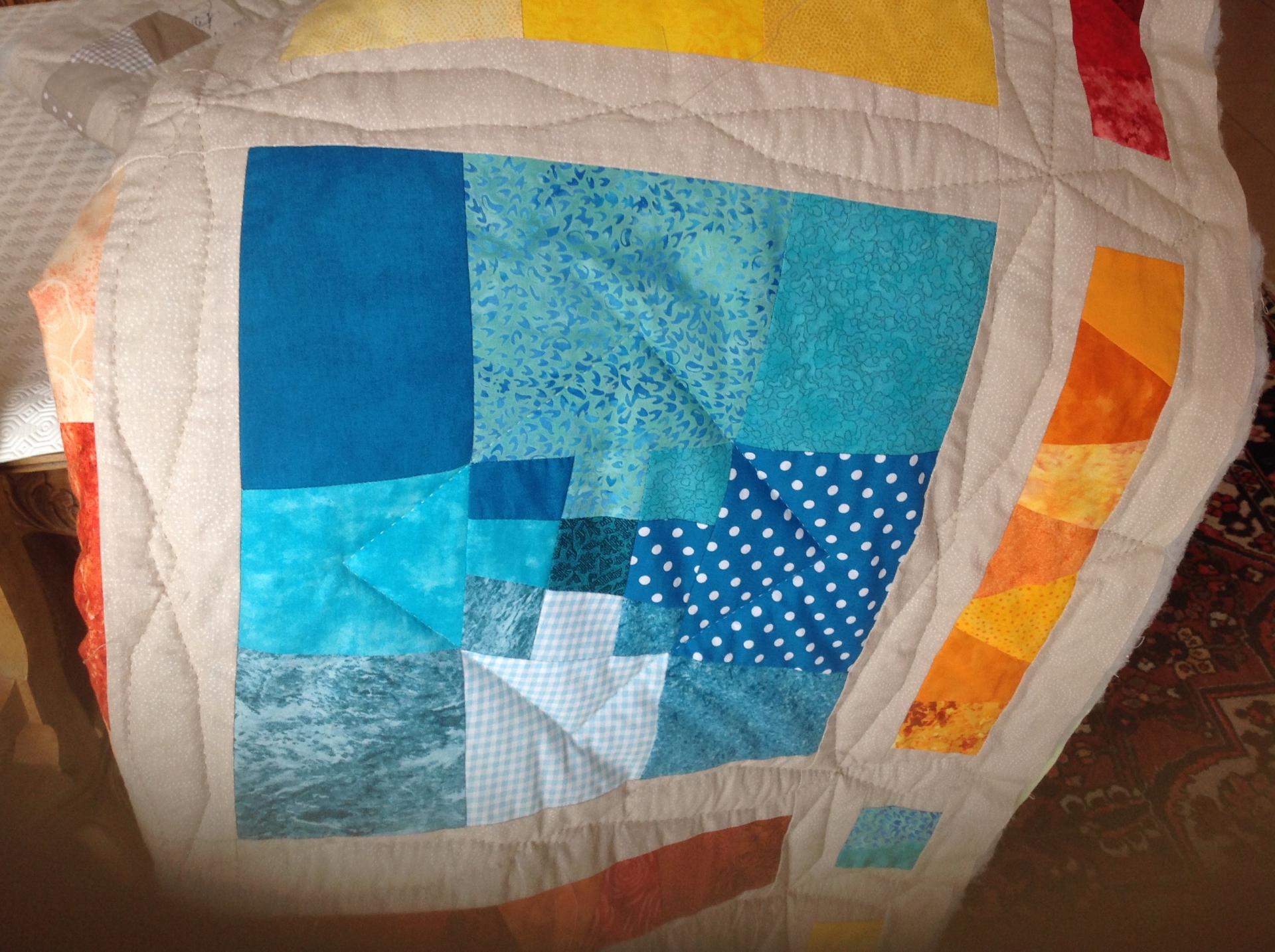 Motifs quilting sur le bloc et sur la bande